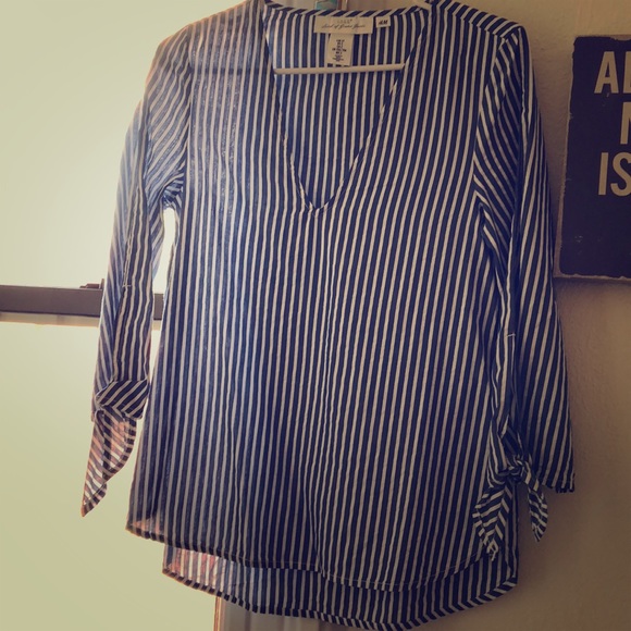 H&M Tops - Blue and white striped V-neck shirt